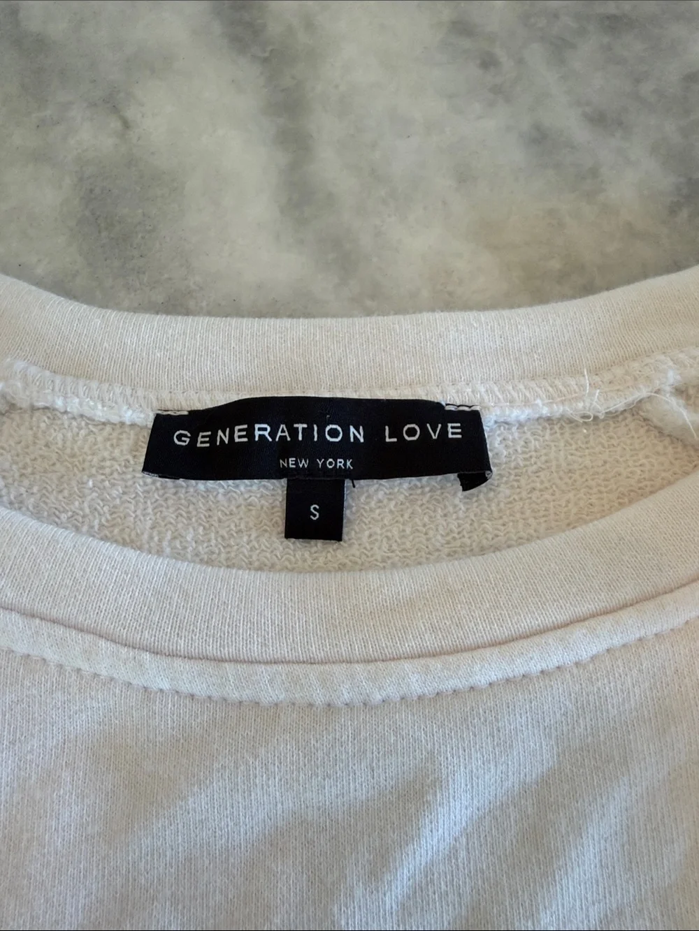 Generation Love White Crewneck Sweater with Hot Pink Tassel Trim